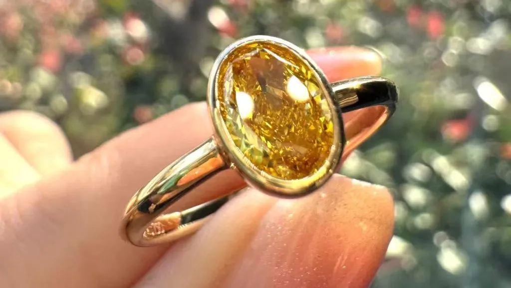 Orange lab diamonds ring